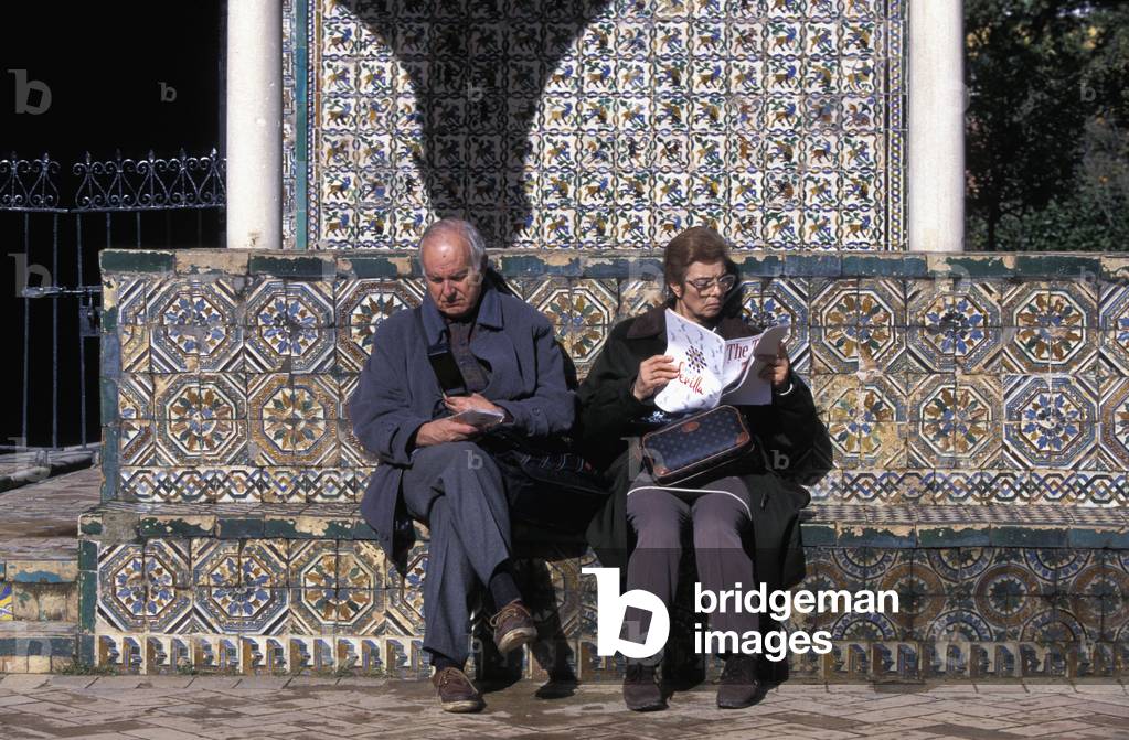 Couple During Tour of Alcazar Gardens, Residence of Muslim and Christian Royalty Founded in 11Th Century (photo)