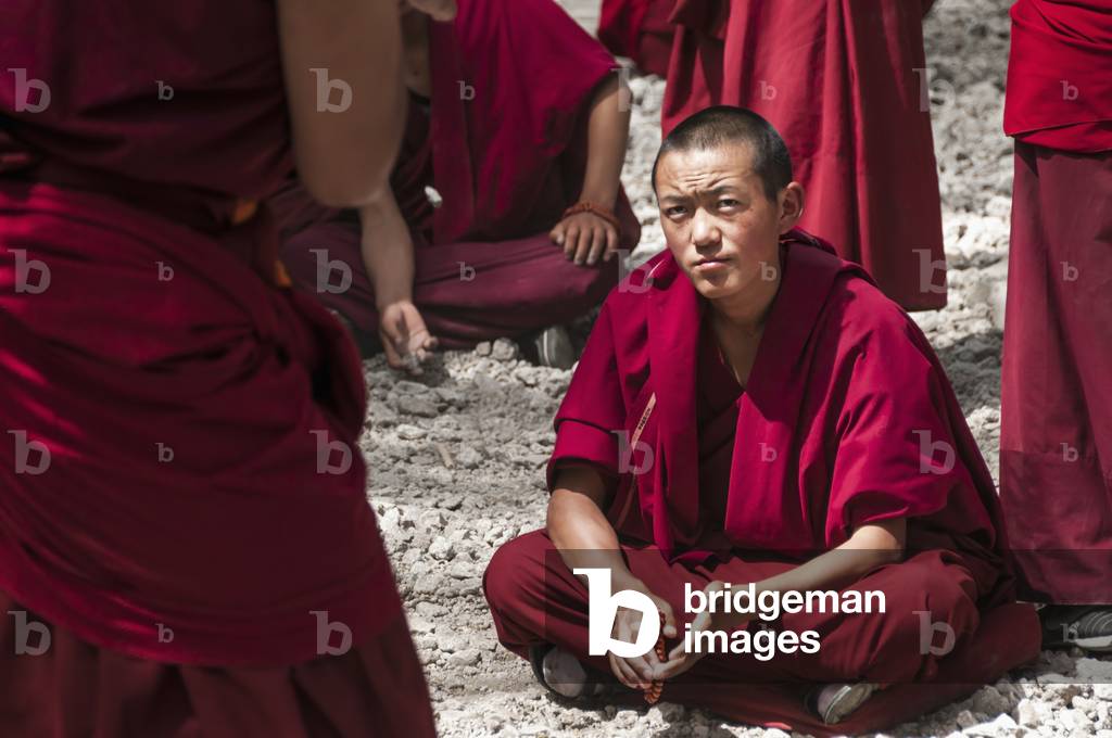 A traditional Tibetan debate in Sera Buddhist Monastery, near Lhasa, Tibet, China (photo)