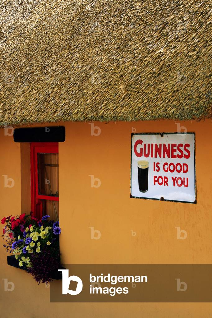Dromina, County Cork, Ireland; Pub Exterior With Thatched Roof (photo)