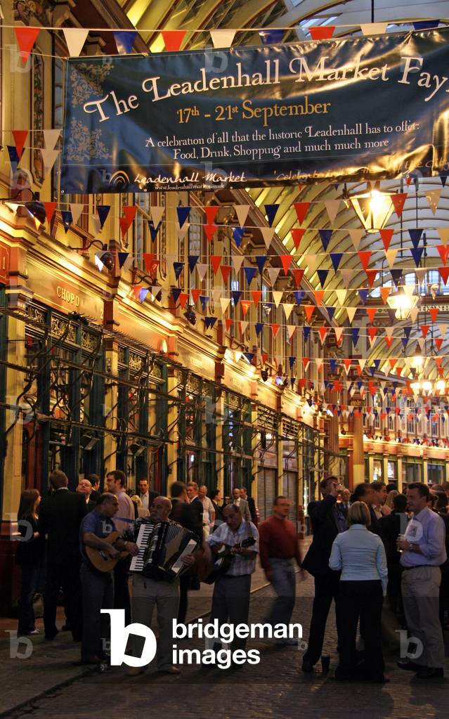 People Enjoying The Leadenhall Market Fair, London, England, UK (photo)