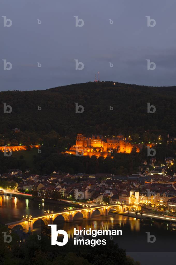Heidelberg Castle and the old bridge over River Neckar illuminated at nighttime, Heidelberg, Germany (photo)
