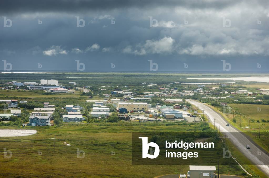 Aerial view of Bethel, Kuskokwim River with rain clouds in the background, summer, Southwest Alaska, USA (photo)