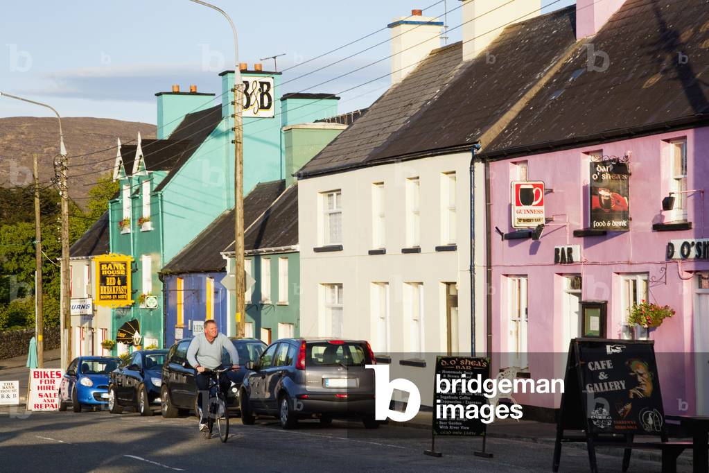 Colourful buildings along a street; Sneem, County Kerry, Ireland (photo)