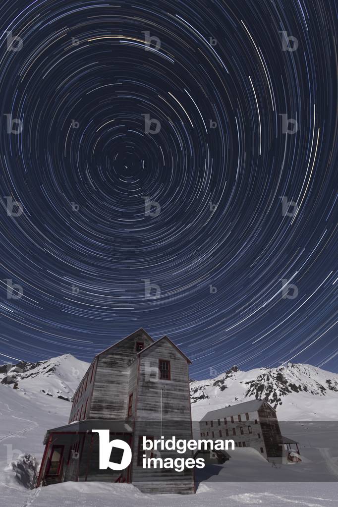 Star trails circle above Independence Mine and the Talkeetna Mountains at Hatcher Pass State Recreation Area, Matanuska Valley, Southcentral Alaska (photo)