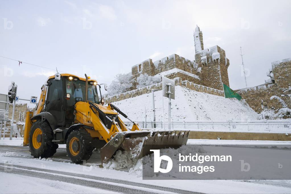 Israel, Old City walls and Tower of David in background, Jerusalem, Snow mower on street, 2013, January 10 (photo)