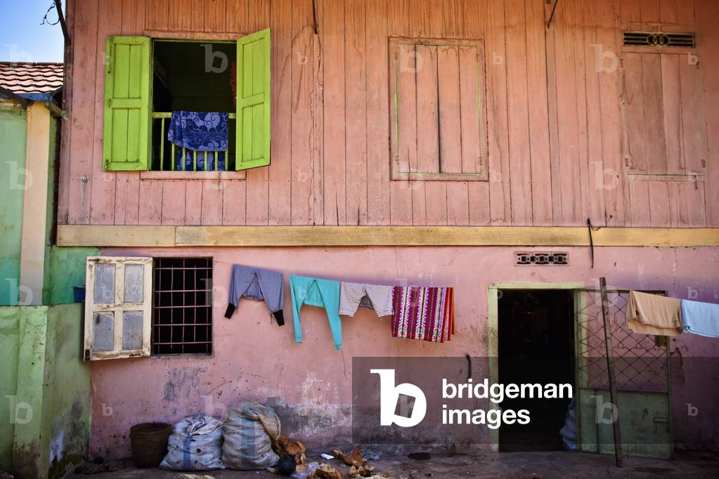 A Clothesline hanging outside of a House, Muara Pinang Sumatera Selatan Indonesia (photo)