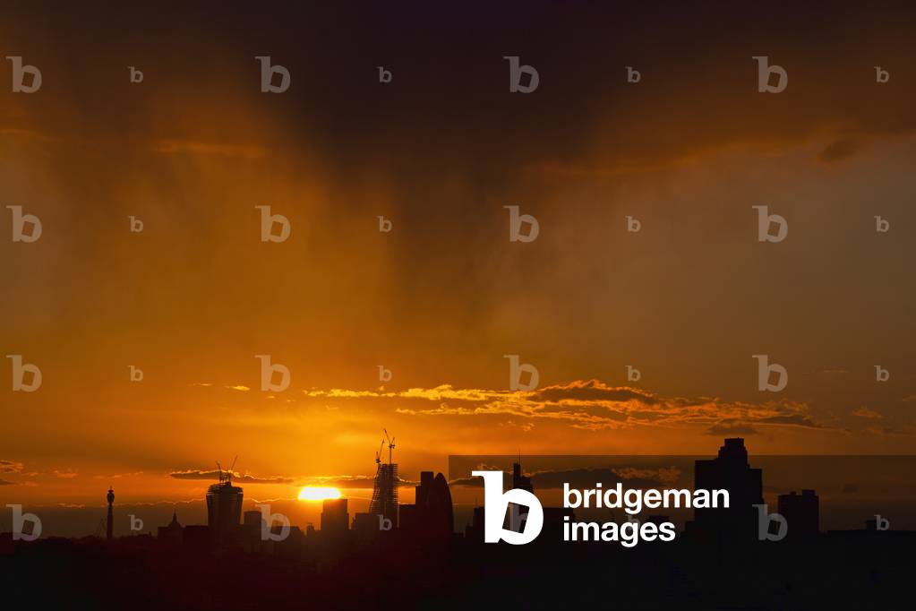 City of London Skyline with Setting Sun, London, England, UK  (photo)