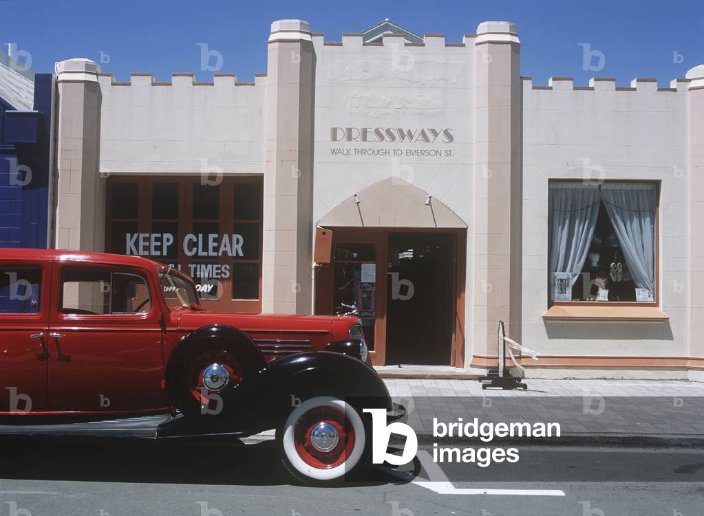 Vintage Car Outside Art Deco Building, North Island, New Zealand (photo)