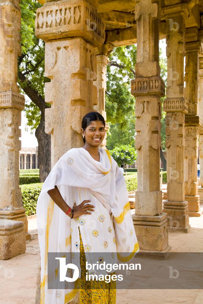 Qutub Minar Complex, Beautiful Woman in colourful Sari, New Delhi, India (photo)