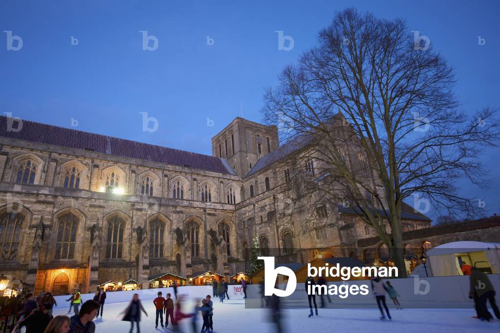 Winchester Cathedral ice rink for Christmas market, Winchester, Hampshire, England, UK  (photo)