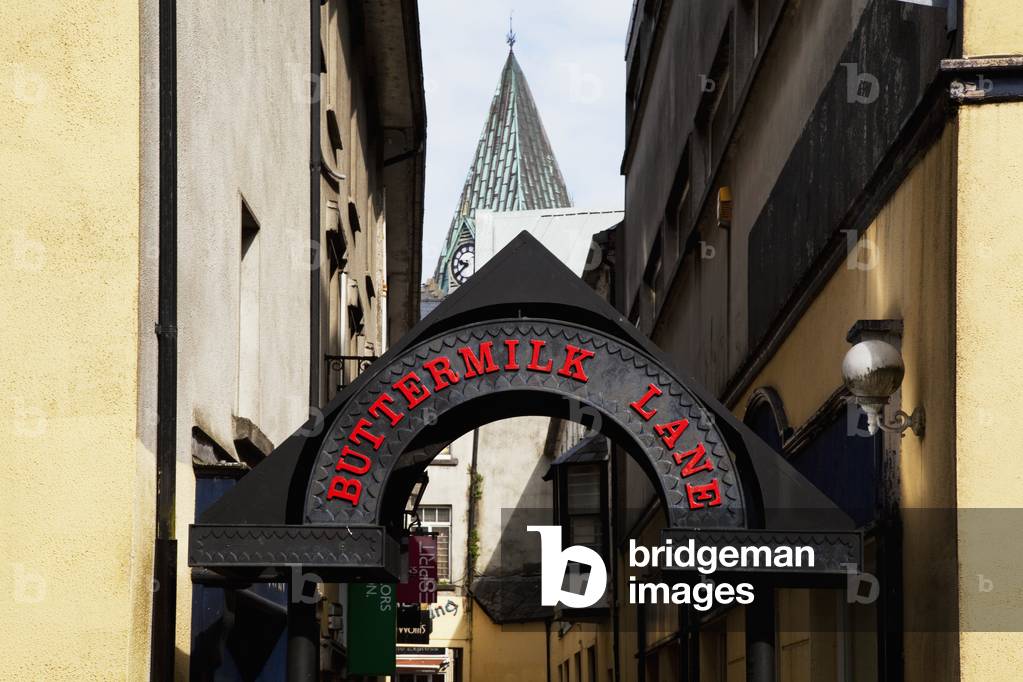 Sign for Buttermilk Lane between buildings; Galway City, County Galway, Ireland (photo)