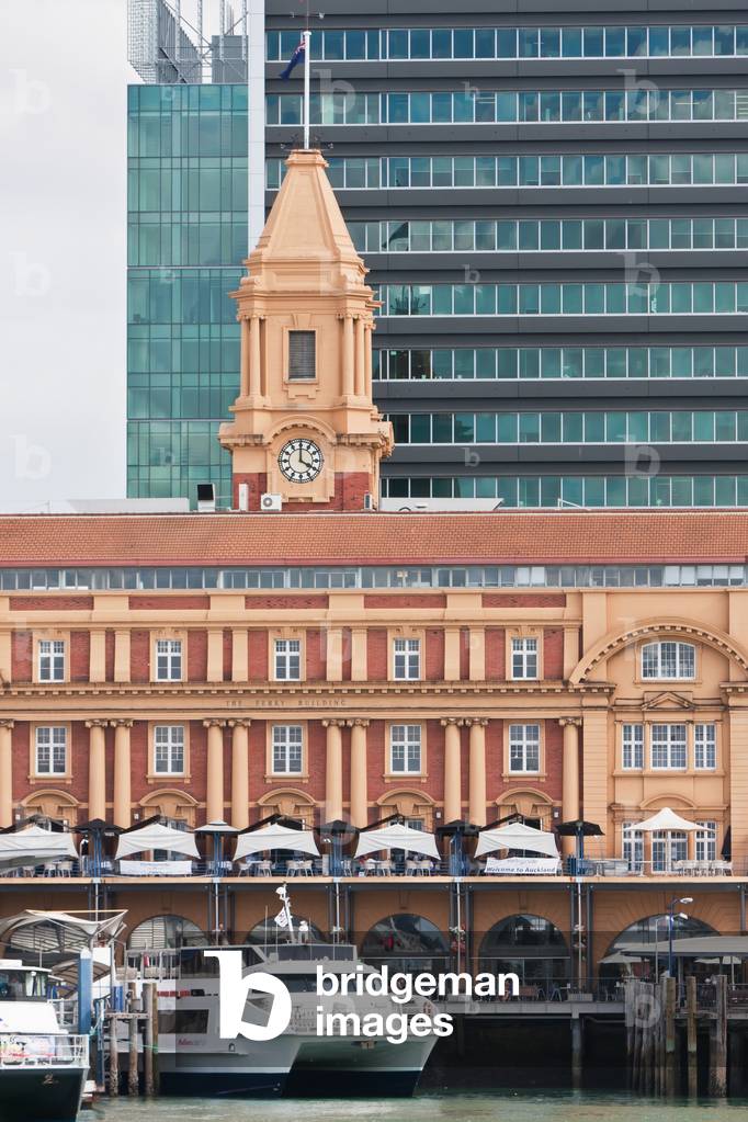 Ferry Moored Near Building with Clock Tower, New Zealand (photo)