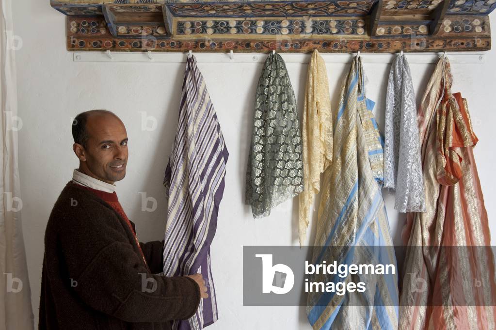 Silk scarves on display at Guellala Museum, Djerba, Tunisia (photo)