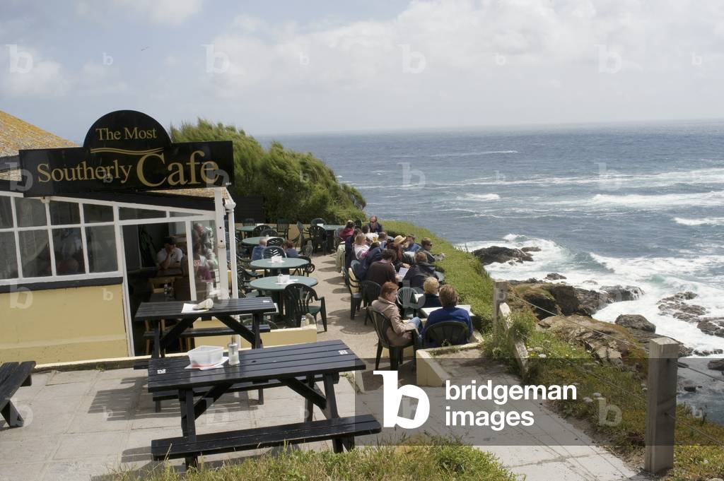 UK, England, People Relaxing in Cafe at Lizard Point, Cornwall (photo)