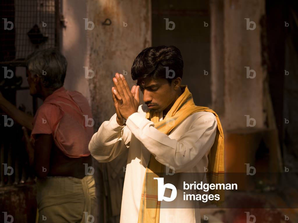 Man Praying in Temple, Varanasi, India (photo)