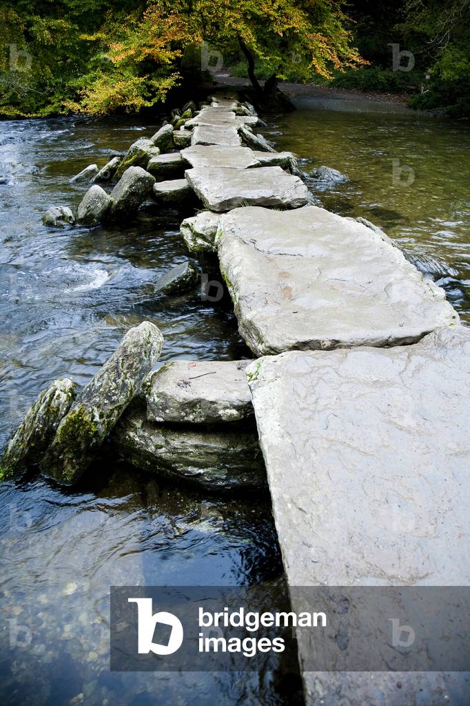 The Tarr Steps, a prehistoric clapper bridge across the River Barle, Exmoor National Park, Somerset, England (photo)