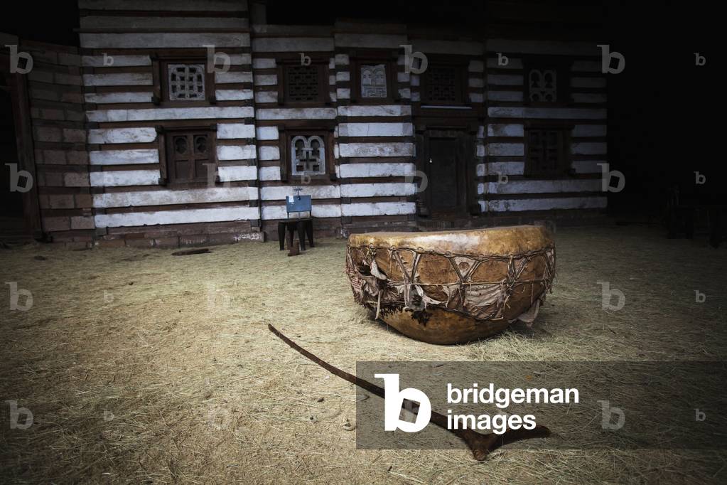 Ceremomial drum and staff outside the Yemrehanna Kristos Church, near Lalibela, Ethiopia (photo)