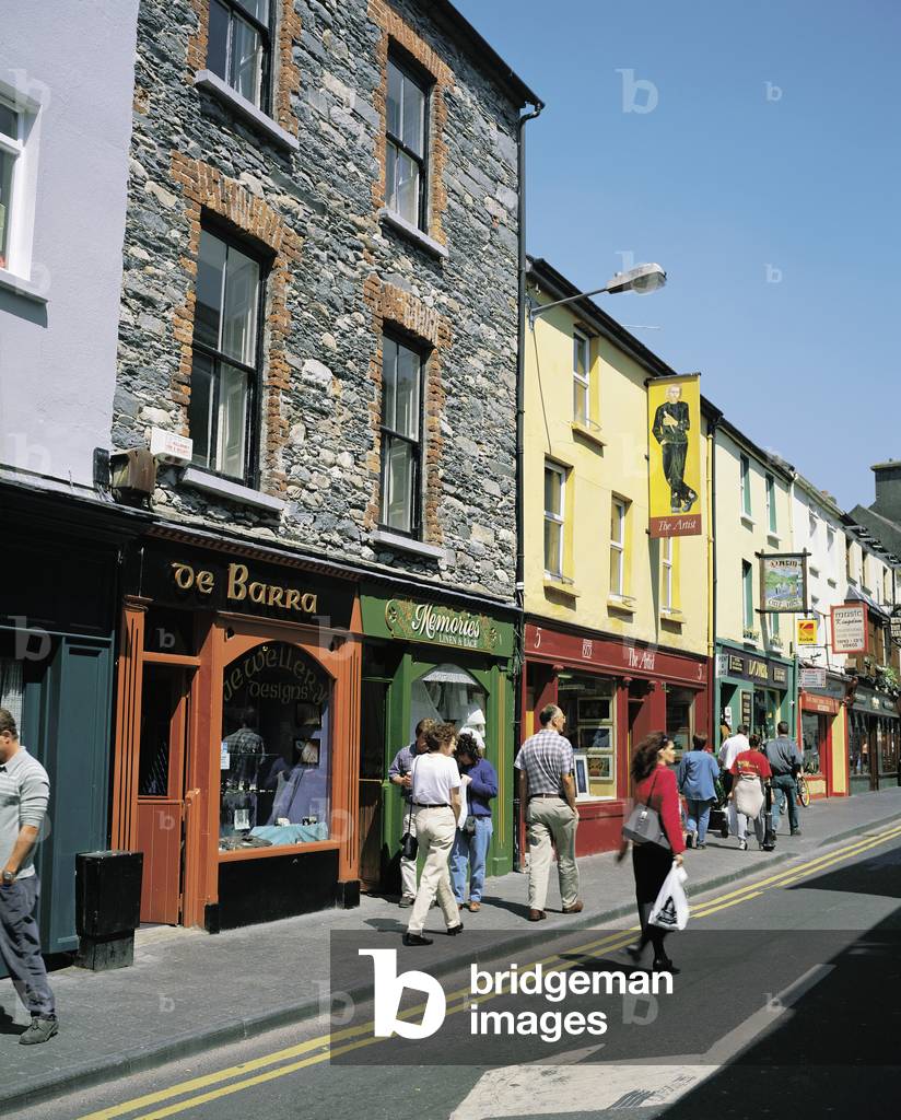 Killarney, Co Kerry, Ireland; People Walking Through A Town (photo)