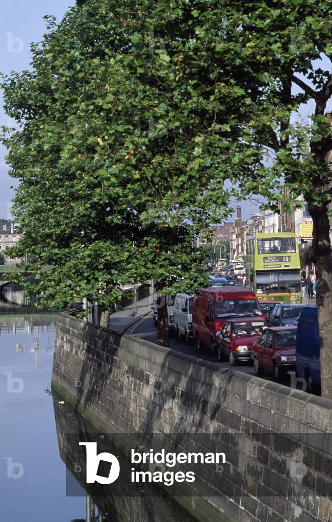 Dublin,Co Dublin,Ireland;Traffic Lined Up Next To River (photo)