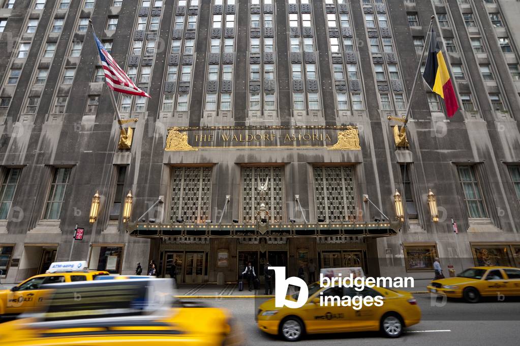 Taxis Passing By the Waldorf Astoria Hotel in Midtown Manhattan, New York, USA (photo)