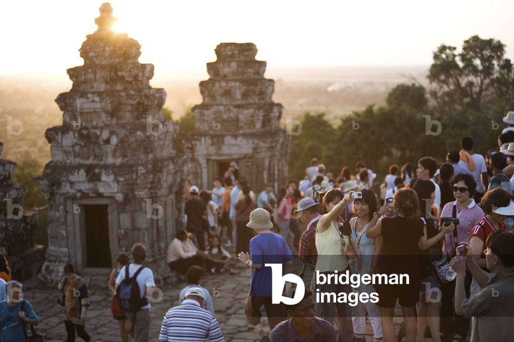 Tourists in the Ancient City of Angkor, Angkor Wat, Siem Reap, Cambodia (photo)