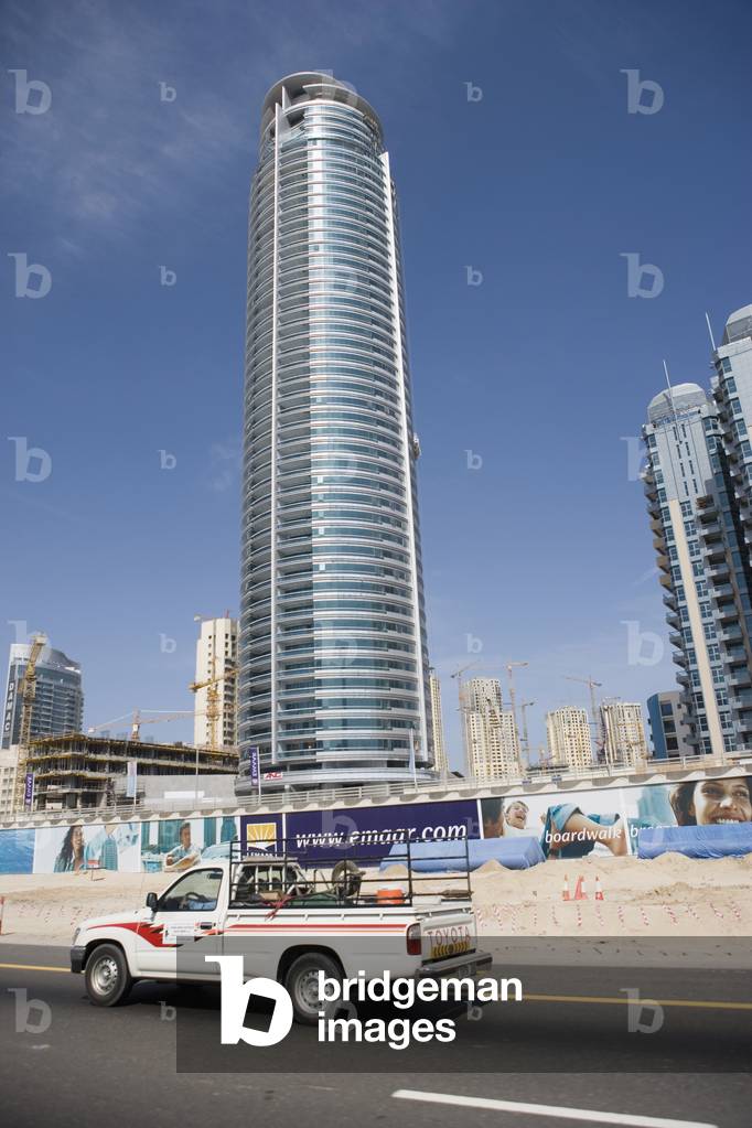 United Arab Emirates, Posters Along Roadside Showing Aspirational Lifestyle Images, Dubai, New Building Development (photo)