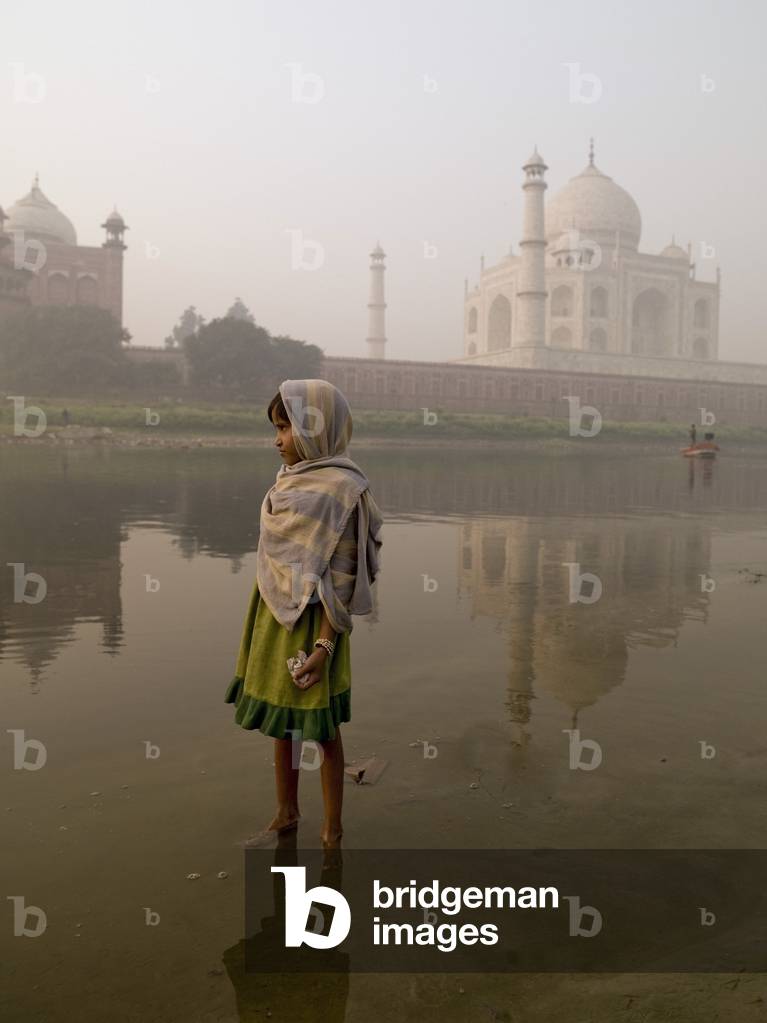 Portrait of Young Girl Standing in the River, Taj Mahal, Agra, India (photo)