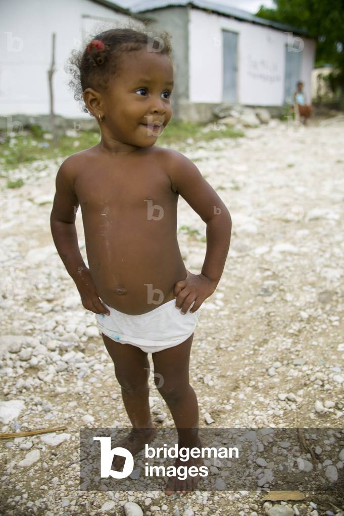 Neiba, Baoruco Province, Dominican Republic, West Indies, Caribbean, Toddler Girl in Diaper (photo)
