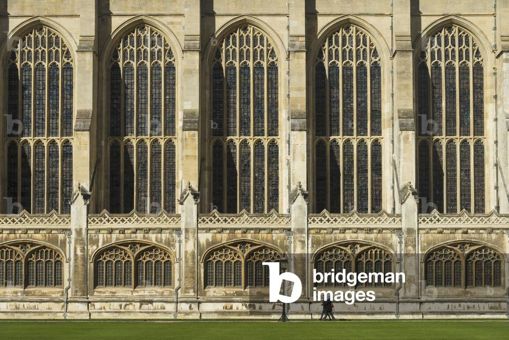People walking past Kings College Chapel, Cambridge, Cambridgeshire, England, UK  (photo)