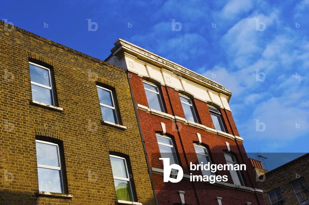 A brick residential building, Brick Lane, London, England, UK  (photo)
