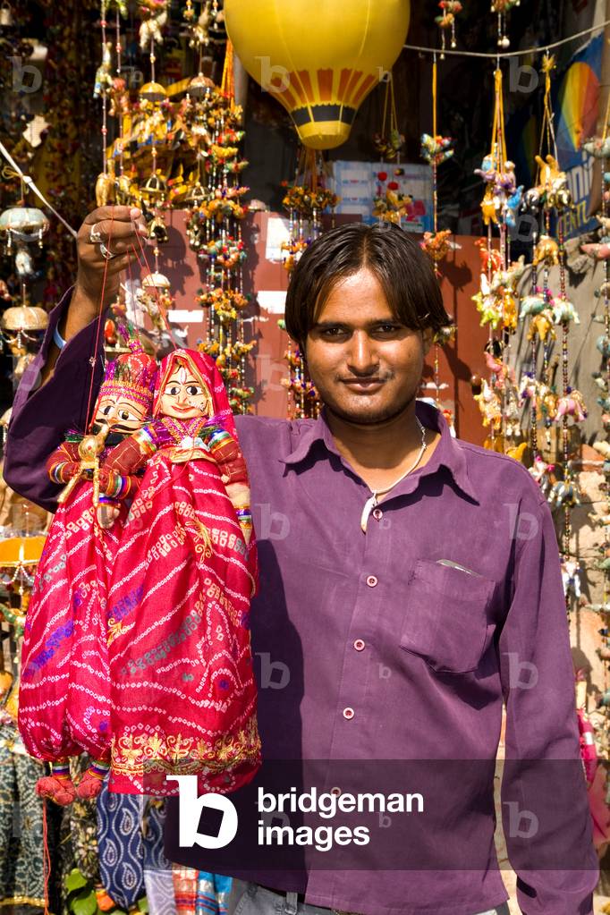 Man Selling Puppets in Downtown Center of the Pink City, Jaipur, Rajasthan, India (photo)