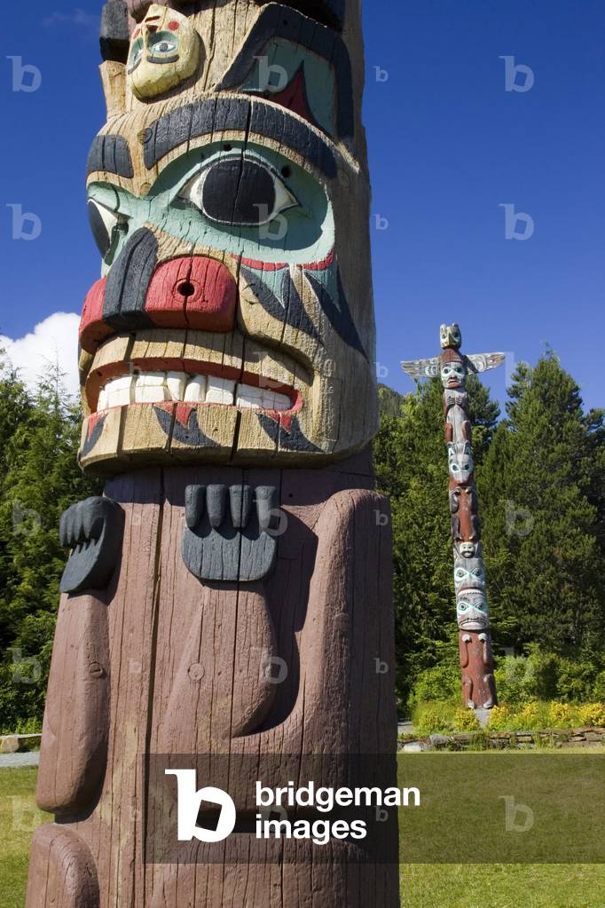 Totem Poles at Saxman Village Near Ketchikan Alaska Southeast Summer Tongass National Forest (photo)