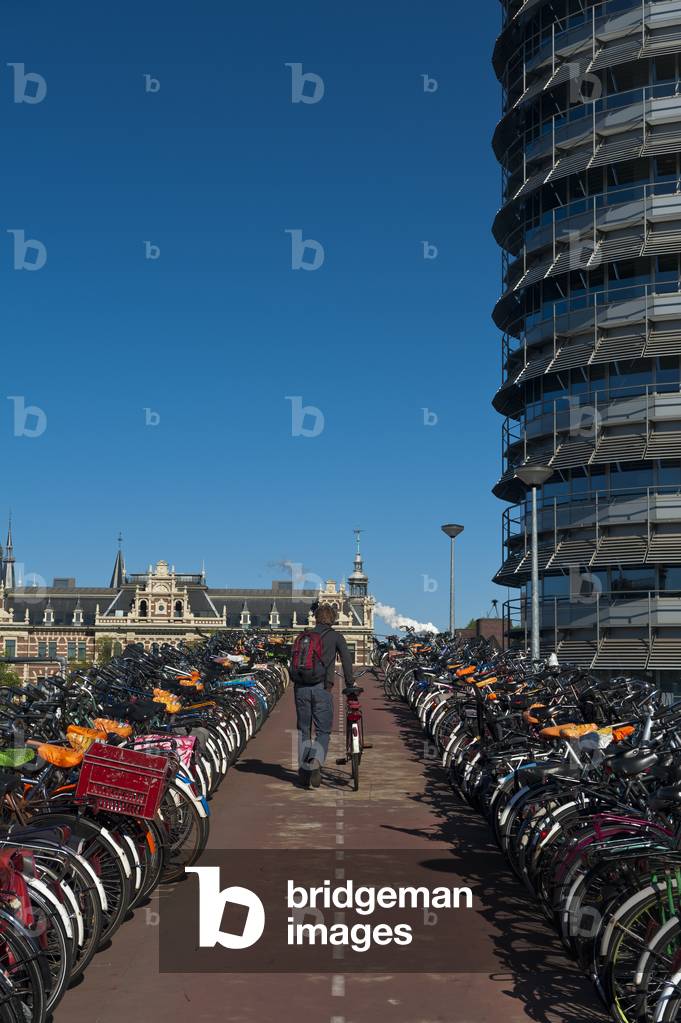 Large bike parking area beside Central Station, Amsterdam, Holland (photo)