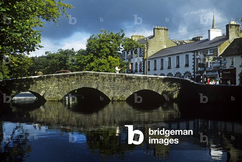 Bridge Over A River In Front Of Buildings, The Mall, Westport, County Mayo, Republic Of Ireland (photo)