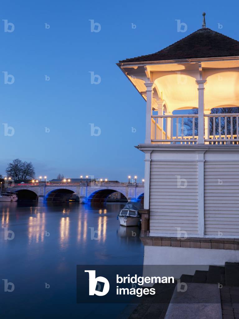 Buildings and a bridge along the river at dusk, Kingston Upon Thames, England, UK  (photo)