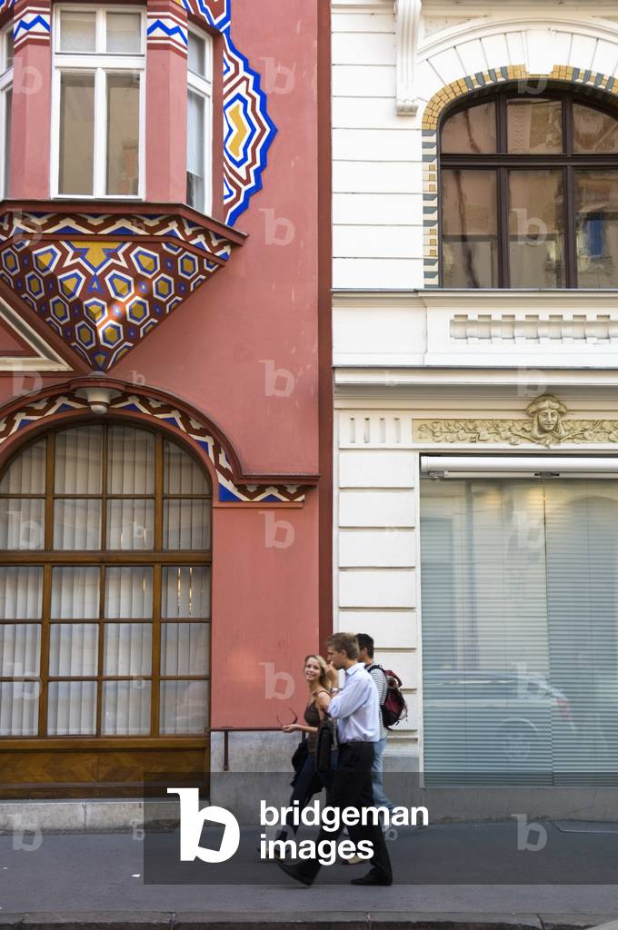 People Walking Past A Highly Decorated Building, Ljubljana, Slovenia (photo)