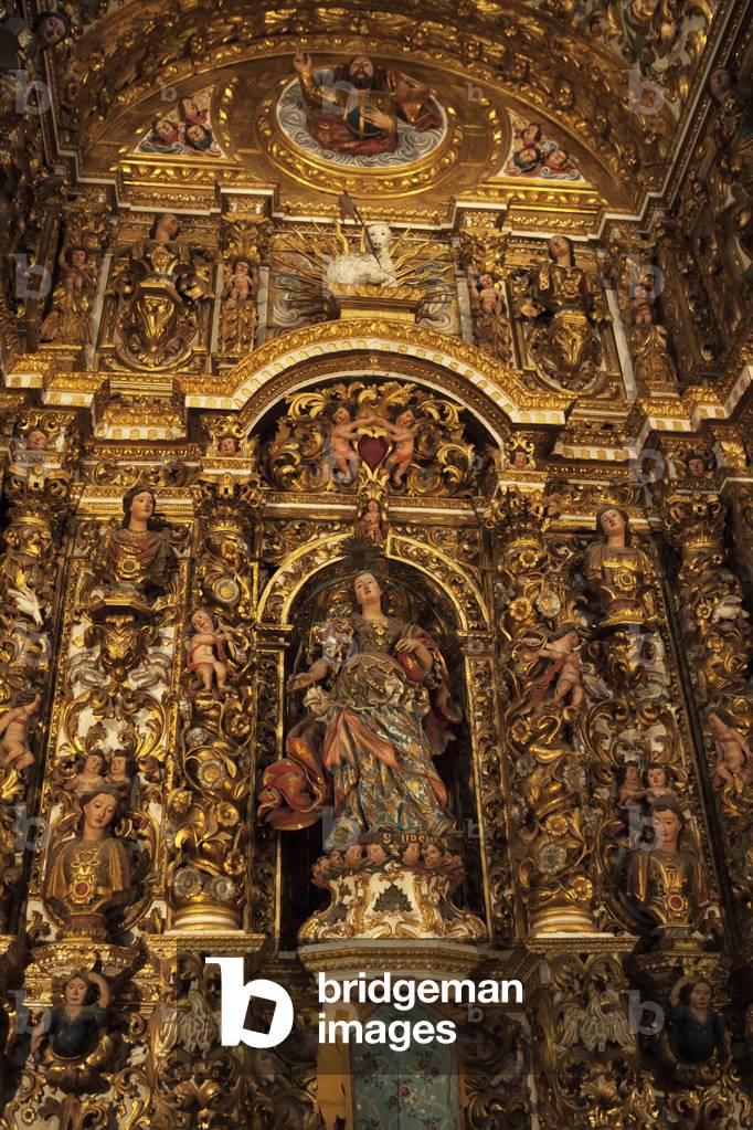 An ornate baroque altar to Saint Ursula in the church of San Francisco, Salvador, Bahia, Brazil (photo)