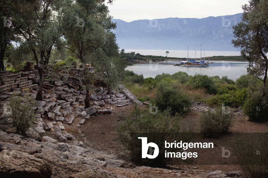 Turkey, Gokava Gulf, Behind Cleopatra Beach, Sedir (Cedrai) Island, Gulet Boat Seen From Ruins of Amphitheater (photo)