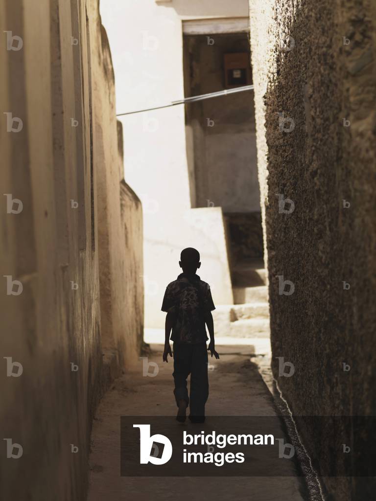 Boy Between two Buildings, Kenya, Africa (photo)