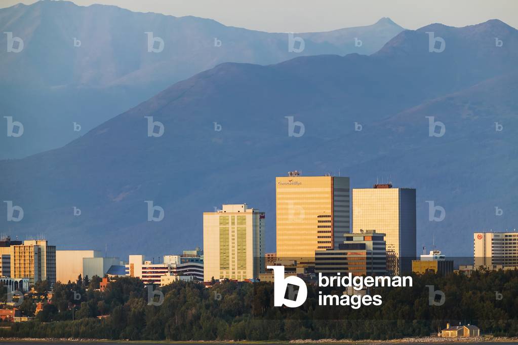 Anchorage Alaska city skyline, along the Cook Inlet at sunset; Anchorage, Alaska, United States of America (photo)