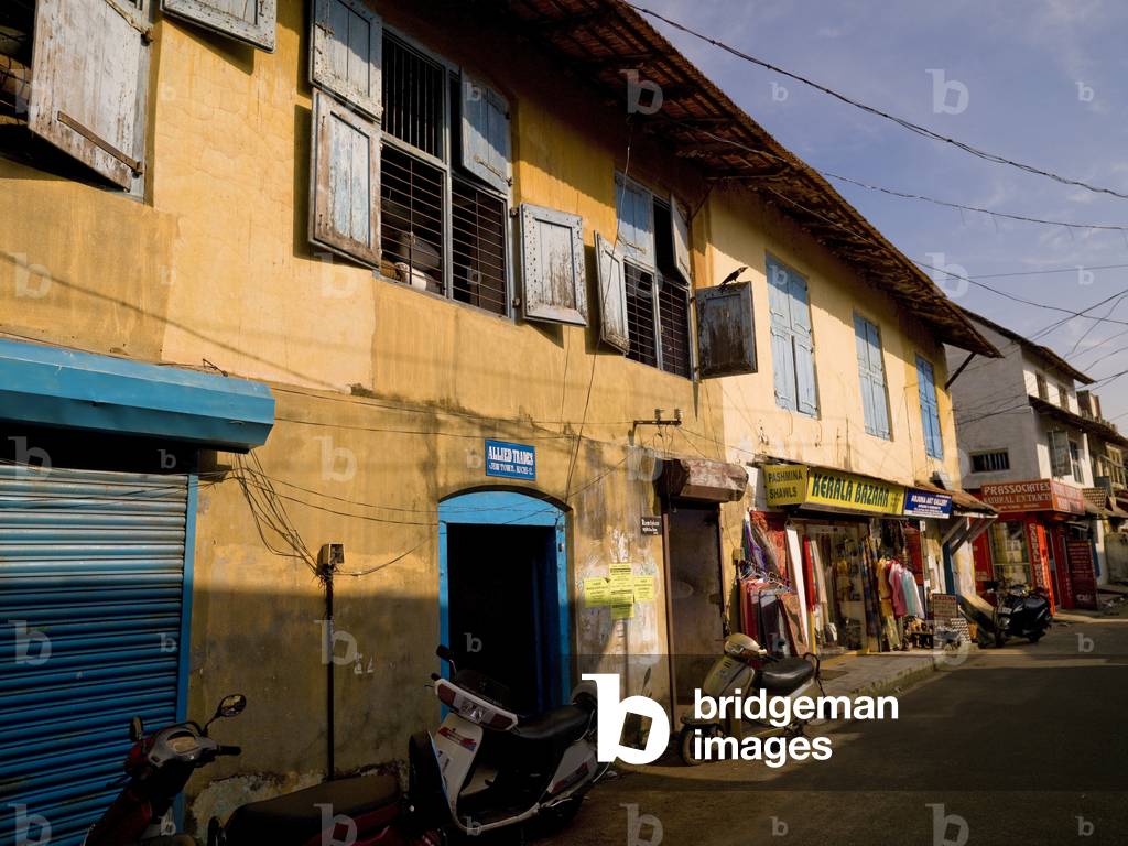 Scooters Lined Up outside Shop Fronts, Jewtown, Cochin, Kerala, India (photo)