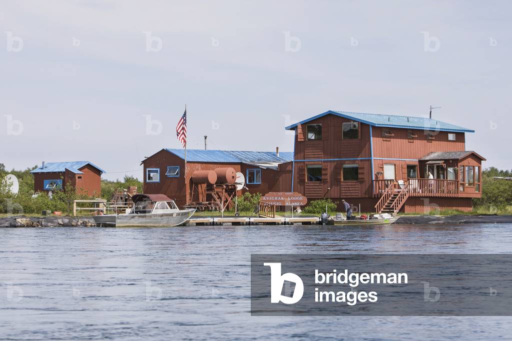 A View Of The Kvichak Lodge From The Water With Riverboats Docked On The Kvichak River; Bristol Bay Igiugig Alaska United States Of America (photo)