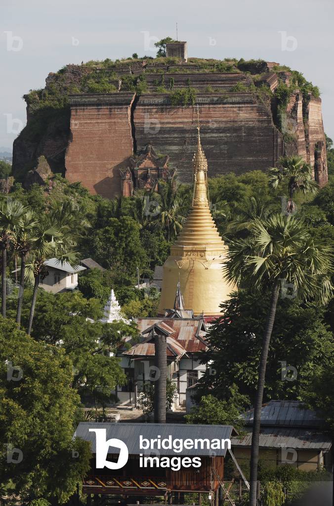Huge cracks cut through the brick facade of the unfinished Mingun Pagoda that was destroyed by an earthquake, Mandalay, Burma (photo)