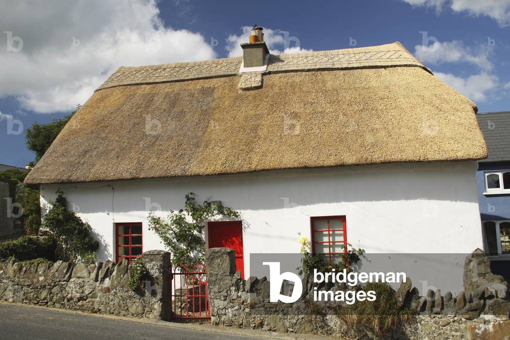 Thatched Cottage In Munster Region; Annestown, County Waterford, Ireland (photo)