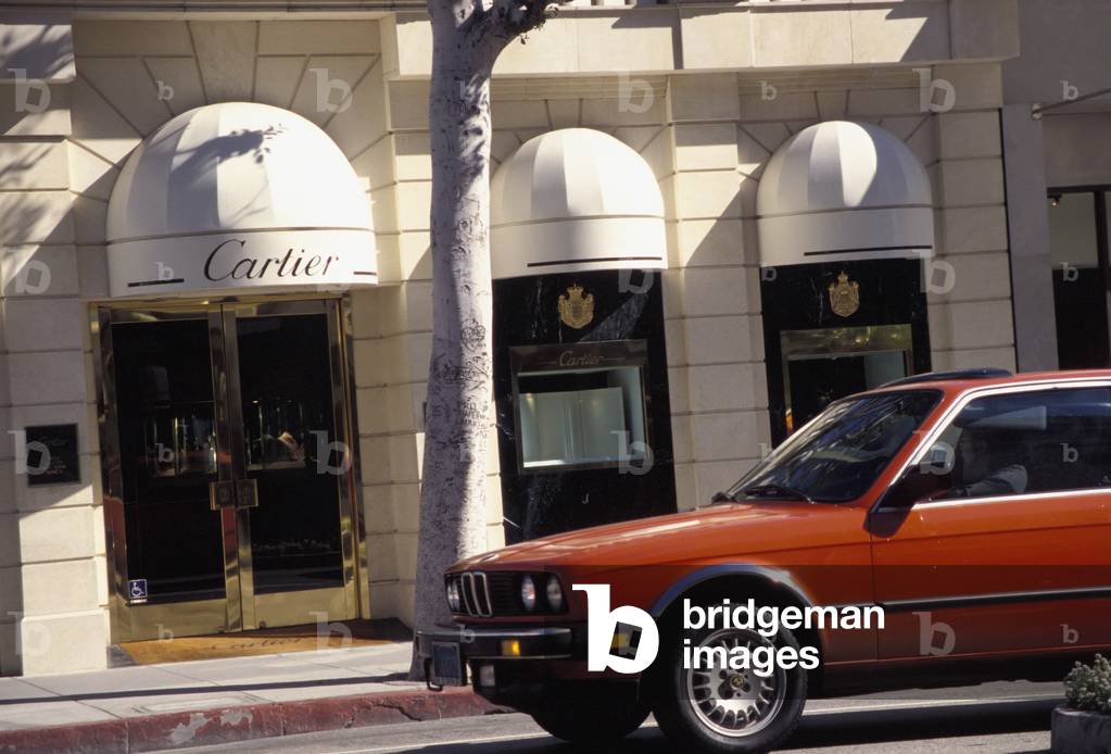 Car Passing Shops on Rodeo Drive, Los Angeles, California, USA (photo)