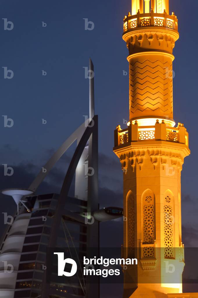 Minaret of small mosque and Burj Al Arab hotel at dusk, Dubai, United Arab Emirates (photo)