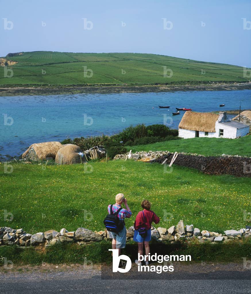 Clifden, Co Galway, Ireland; People Hiking Along The Sky Road (photo)