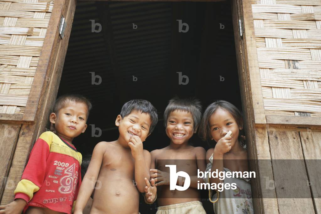 Children Laughing in Doorway, Bolaven Plateau, Champasak Province, Laos (photo)