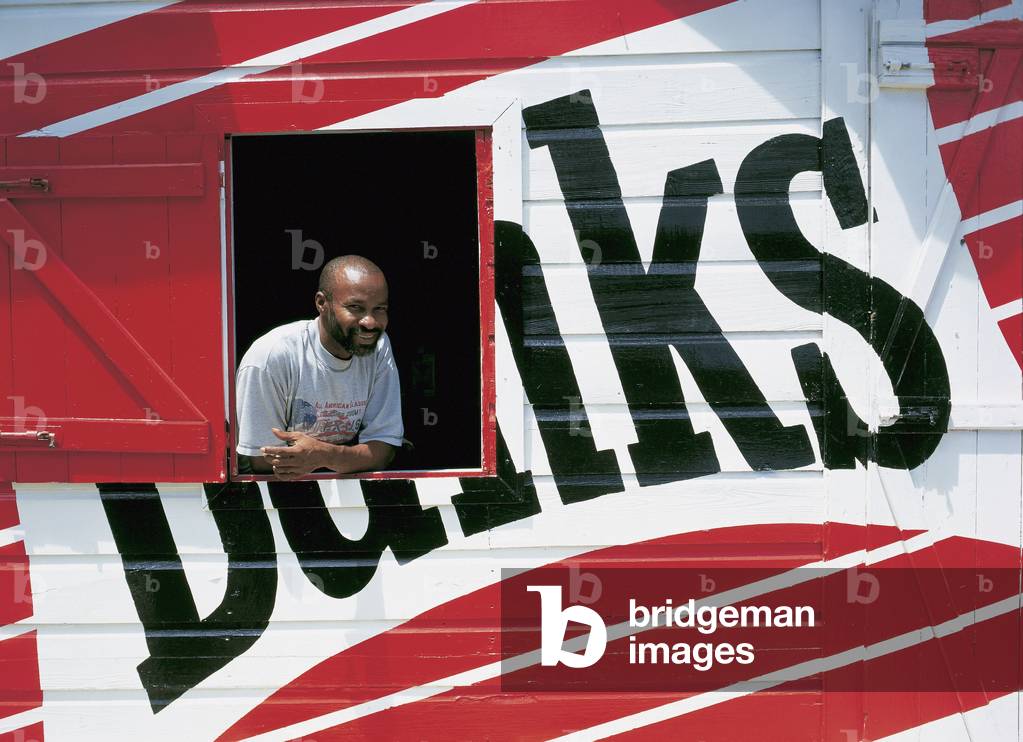 Young Man in Window of Banks Bar, Barbados (photo)
