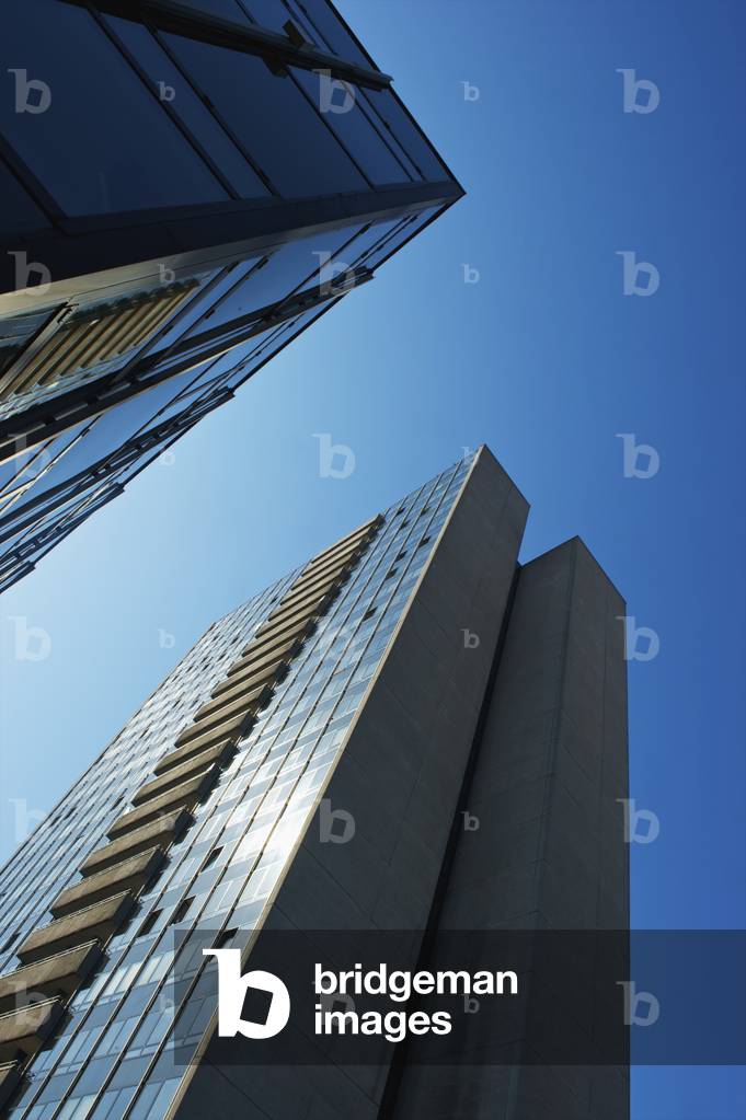 Office buildings against a blue sky, Hamburg, Germany (photo)